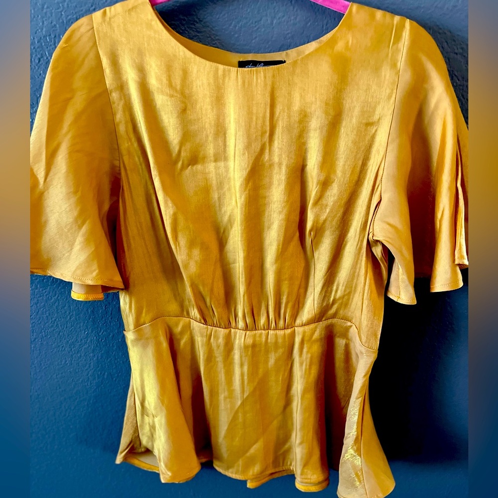 Bright gold peplum top.  Size large